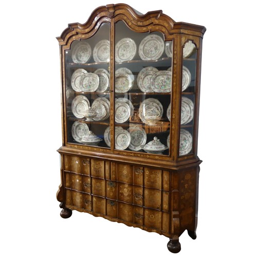 617 - An 18th century Dutch Walnut and Marquetry Inlaid Display Cabinet, the moulded and arched cornice ab... 