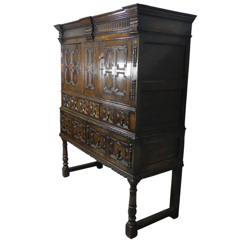 343 - A 19thC Carolean style oak Chest on stand, of large proportions, moulded cornice above two chequer i... 