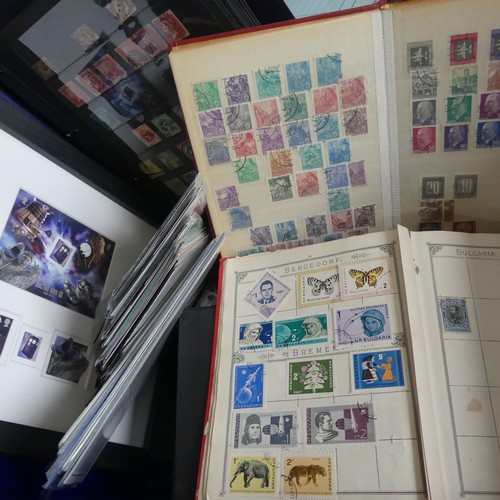 552 - Stamps: A collection of stamps in eleven albums and stock books including Germany and States, GB wit... 