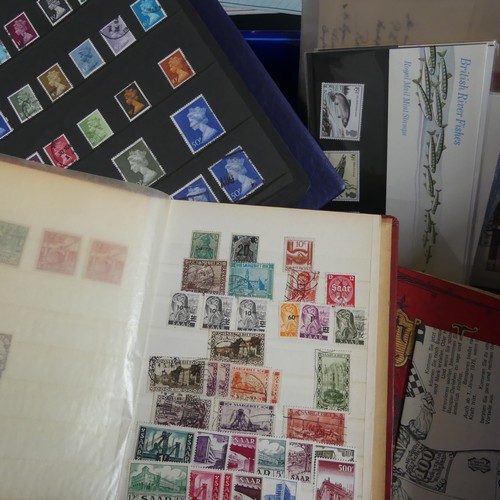 552 - Stamps: A collection of stamps in eleven albums and stock books including Germany and States, GB wit... 