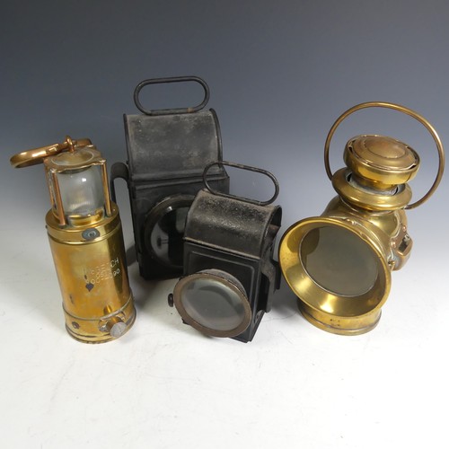 663 - A brass miners Lamp marked 'McGEOCH 0583', together with a possible Lucas Burbury brass Vintage moto... 