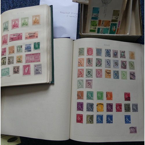 556 - Stamps: A collection of stamps in two albums and loose including Canada, Ireland, etc. (2).... 