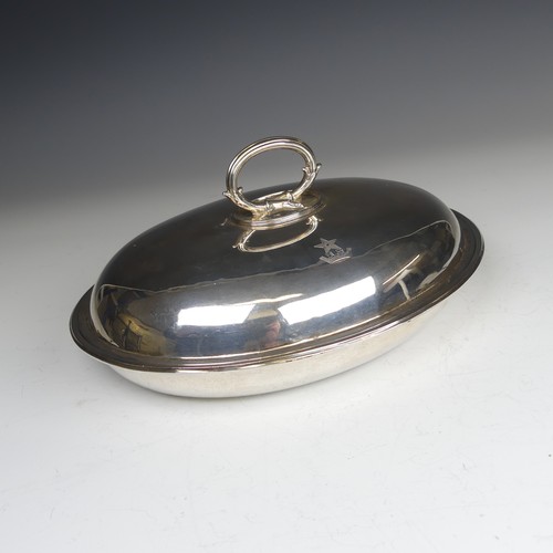 40 - A Victorian oval silver Entrée Dish, hallmarked London 1883, with loop handle, crested with Peile fa... 