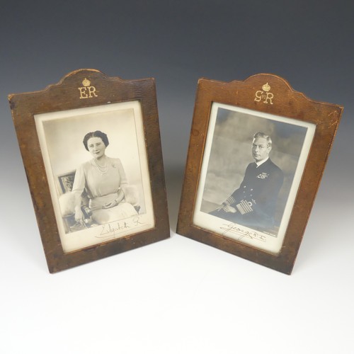 531 - A pair of portrait photographs of King George VI and Queen Elizabeth, taken by Dorothy Wilding, each... 