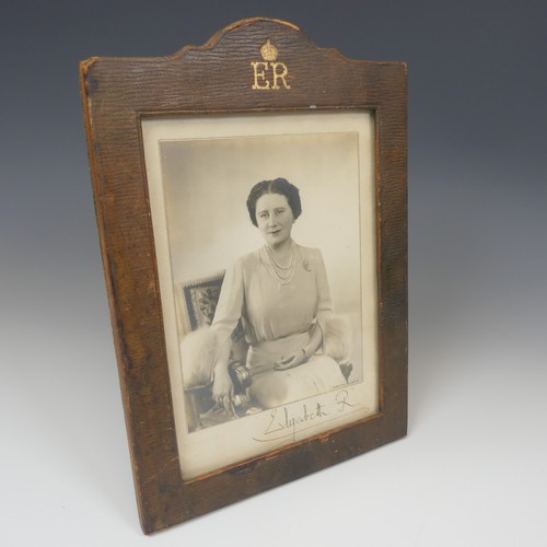 531 - A pair of portrait photographs of King George VI and Queen Elizabeth, taken by Dorothy Wilding, each... 