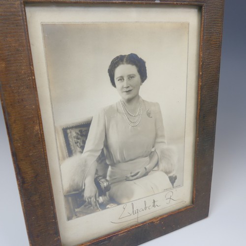 531 - A pair of portrait photographs of King George VI and Queen Elizabeth, taken by Dorothy Wilding, each... 