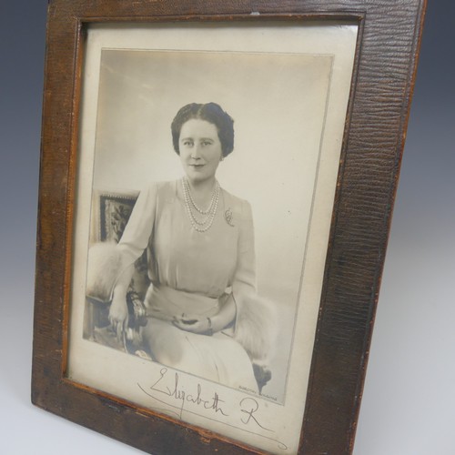 531 - A pair of portrait photographs of King George VI and Queen Elizabeth, taken by Dorothy Wilding, each... 