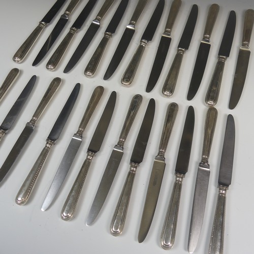 74 - A set of twelve Elizabeth II silver handled Knives, hallmarked for C J Vander Ltd., London 1958/9, w... 