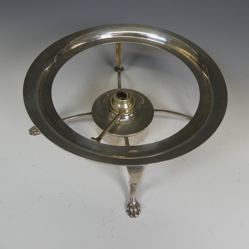 76 - A George V silver Stand and Burner, hallmarked London 1935, of plain circular form raised on four pa... 