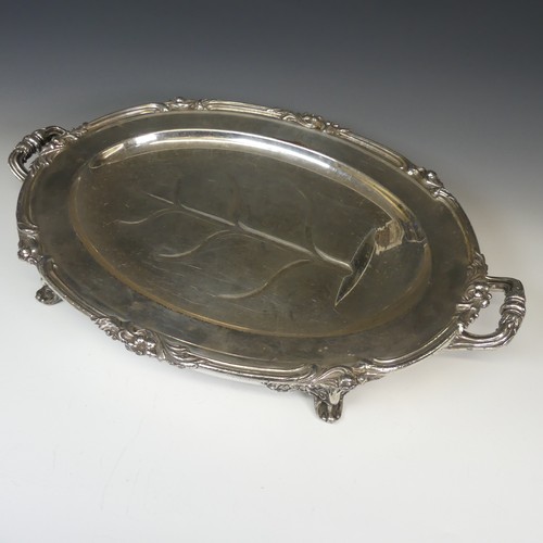 82 - An Old Sheffield Plate water heated Meat Dish, of oval form with foliate rim, the centre with well a... 