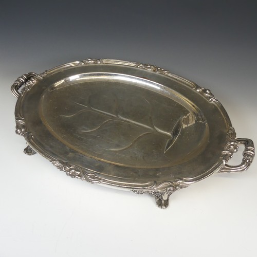 82 - An Old Sheffield Plate water heated Meat Dish, of oval form with foliate rim, the centre with well a... 