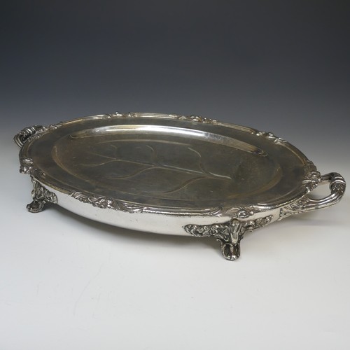 82 - An Old Sheffield Plate water heated Meat Dish, of oval form with foliate rim, the centre with well a... 