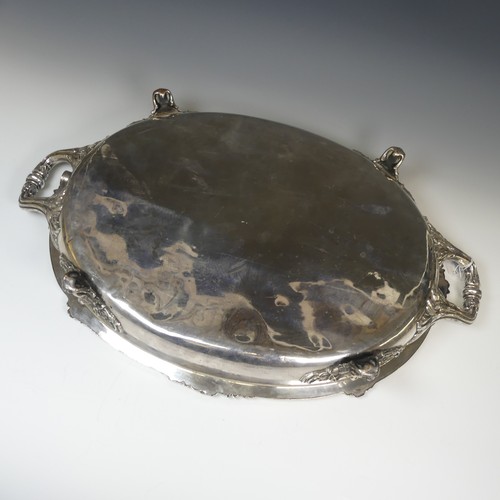 82 - An Old Sheffield Plate water heated Meat Dish, of oval form with foliate rim, the centre with well a... 