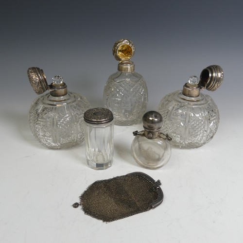 91 - A pair of Edwardian silver mounted cut glass globular Scent Bottles, by C C May & Sons, hallmark... 