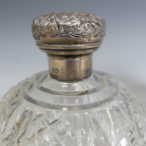 91 - A pair of Edwardian silver mounted cut glass globular Scent Bottles, by C C May & Sons, hallmark... 