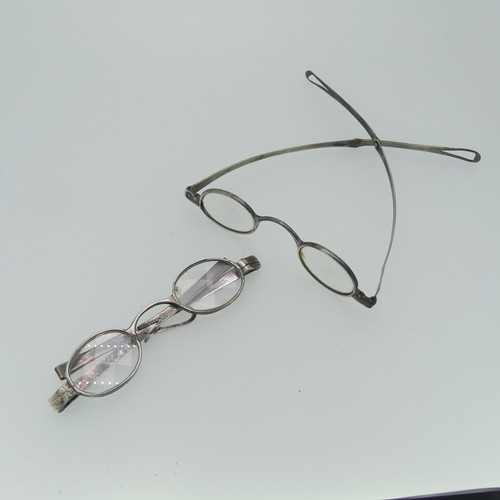 113 - Two pairs of George III silver Spectacles, partially hallmarked only, one with damage to frame and l... 