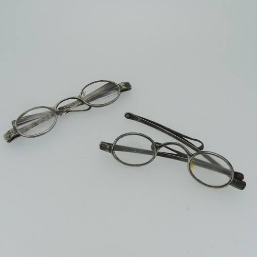 113 - Two pairs of George III silver Spectacles, partially hallmarked only, one with damage to frame and l... 