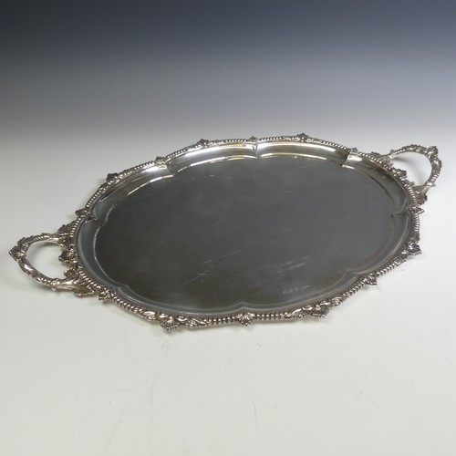 119 - A George VI oval two handled silver Tray, by E. Silver & Co., hallmarked Sheffield, 1947, the lo... 