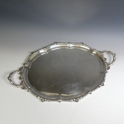 119 - A George VI oval two handled silver Tray, by E. Silver & Co., hallmarked Sheffield, 1947, the lo... 