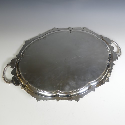 119 - A George VI oval two handled silver Tray, by E. Silver & Co., hallmarked Sheffield, 1947, the lo... 