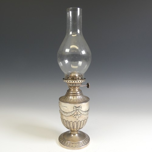 125 - A Victorian silver Oil Lamp, by James Deakin & Sons, hallmarked Sheffield, 1888, of urn shape wi... 