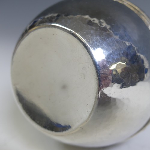 129 - A E Jones; A George V silver Sugar Caster, hallmarked Birmingham, 1920, in the Arts & Crafts sty... 