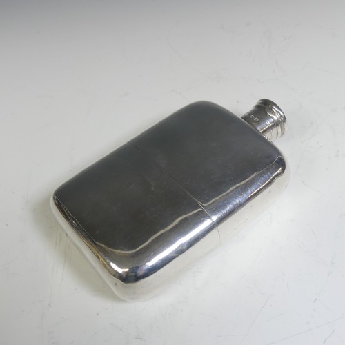 131 - A Victorian silver Hip Flask, by Hewson & Williams, hallmarked London 1895, of rounded rectangul... 