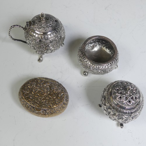 133 - An Indian silver three piece Cruet Set, of circular form with foliate decoration, the mustard with h... 