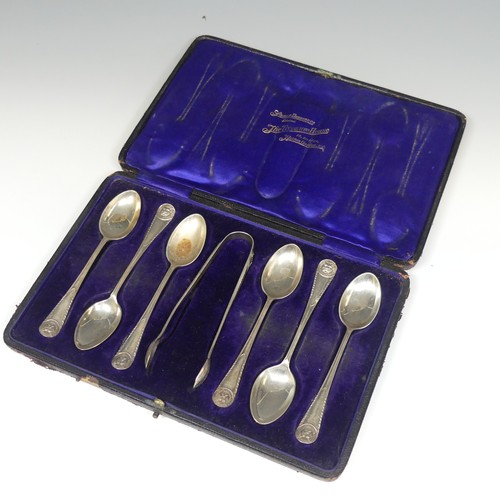 154 - A cased set of six George V silver Teaspoons with Sugar Nips, by James Dixon & Sons Ltd., hallma... 