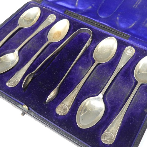 154 - A cased set of six George V silver Teaspoons with Sugar Nips, by James Dixon & Sons Ltd., hallma... 