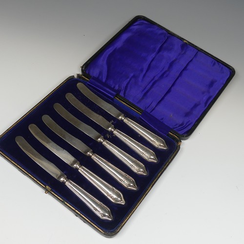 154 - A cased set of six George V silver Teaspoons with Sugar Nips, by James Dixon & Sons Ltd., hallma... 