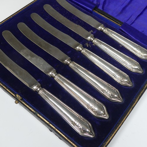 154 - A cased set of six George V silver Teaspoons with Sugar Nips, by James Dixon & Sons Ltd., hallma... 