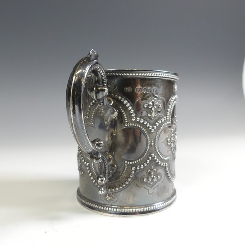 156 - A Victorian silver Christening Mug, by Henry Holland, hallmarked London 1870, in the Gothic style wi... 