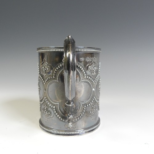 156 - A Victorian silver Christening Mug, by Henry Holland, hallmarked London 1870, in the Gothic style wi... 