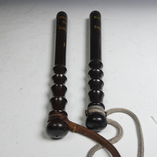 595 - A hardwood Northampton Special Constable truncheon, numbered 110 with ribbed grip and leather thong,... 