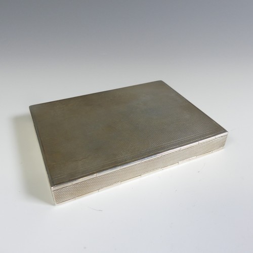 168 - A sterling silver Cigarette Case, with London import marks for 1963, rectangular form with double hi... 