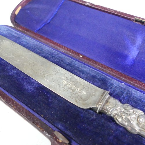 184 - A cased Victorian silver Knife, by John Gilbert, hallmarked Birmingham 1880, with fruit and vine dec... 