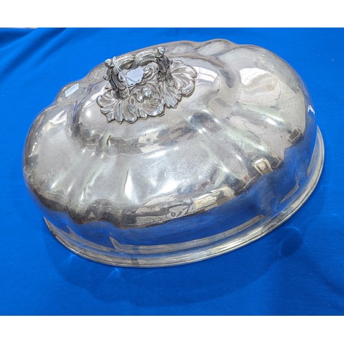 66 - A silver plated Meat Dome, 46cm wide, together with a silver plated two handled rectangular tray, sh... 