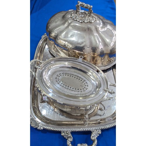 66 - A silver plated Meat Dome, 46cm wide, together with a silver plated two handled rectangular tray, sh... 