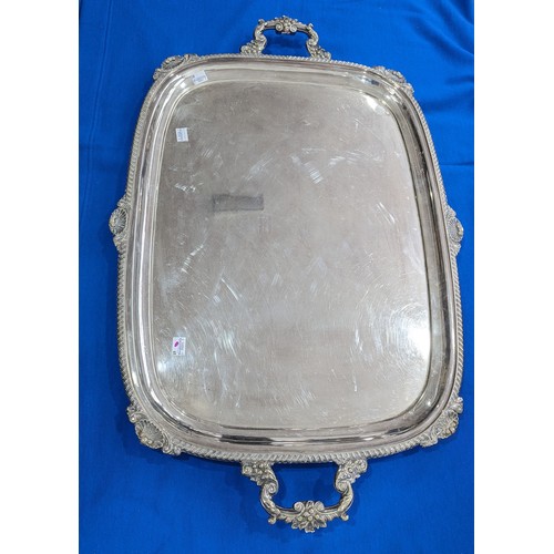 66 - A silver plated Meat Dome, 46cm wide, together with a silver plated two handled rectangular tray, sh... 