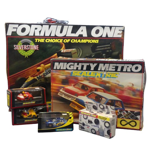 768 - Scalextric Formula One Silverstone set, with two racing cars, two throttles and track, and a Scalext... 