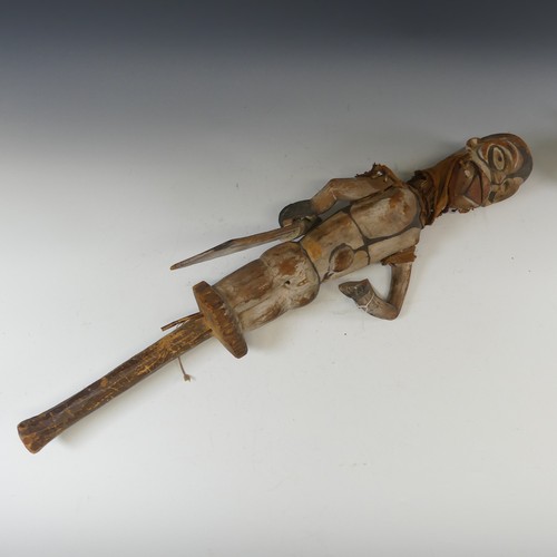 582 - Tribal art; an early 20th century Ogoni (Nigeria) wooden Puppet, with turning head, articulated arms... 