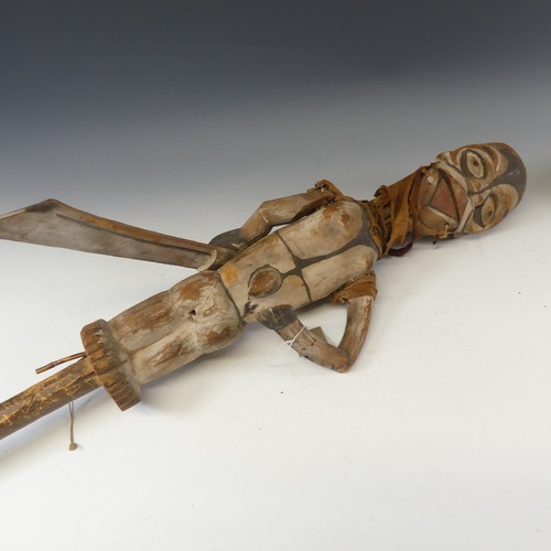 582 - Tribal art; an early 20th century Ogoni (Nigeria) wooden Puppet, with turning head, articulated arms... 