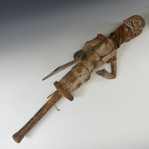 582 - Tribal art; an early 20th century Ogoni (Nigeria) wooden Puppet, with turning head, articulated arms... 