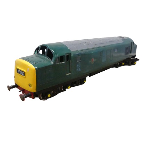 592 - A 5 inch gauge battery operated Locomotive, finished in green a model of a diesel electric locomotiv... 