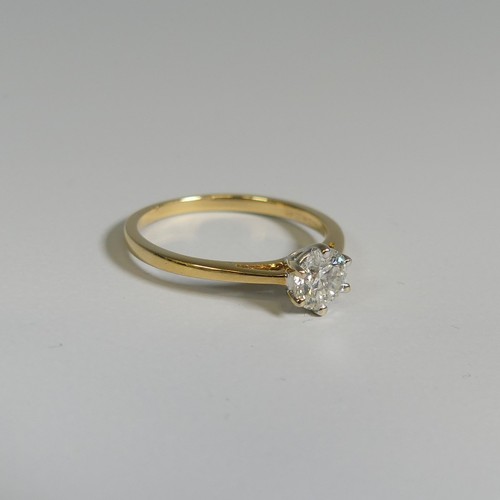 275 - A diamond solitaire Ring, the brilliant cut stone approx. o.62ct, six claw set in 18ct yellow gold, ... 