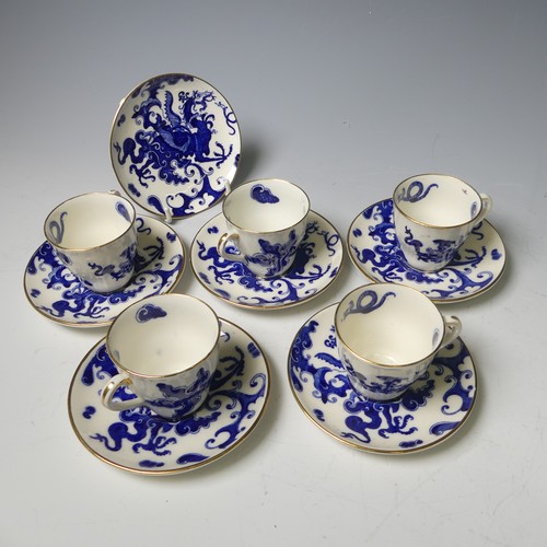 104 - A Royal Worcester chinoiserie dragon pattern part Coffee Set, comprising four Cans and six Saucers, ... 