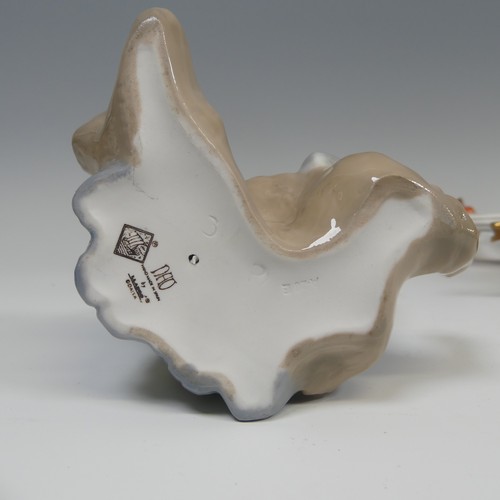 107 - A Herend porcelain double Candlestick, modelled as a Dolphin, together with two Nao figures of Heron... 