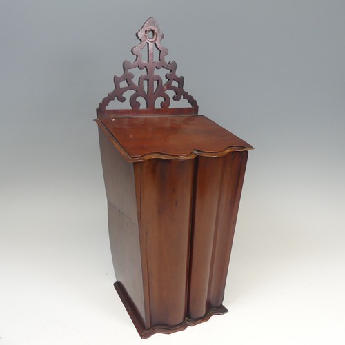 421 - A George III mahogany wall hanging candle Box, with heavily pierced scroll apron above tapering and ... 