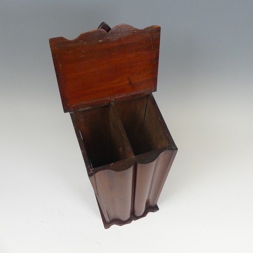 421 - A George III mahogany wall hanging candle Box, with heavily pierced scroll apron above tapering and ... 